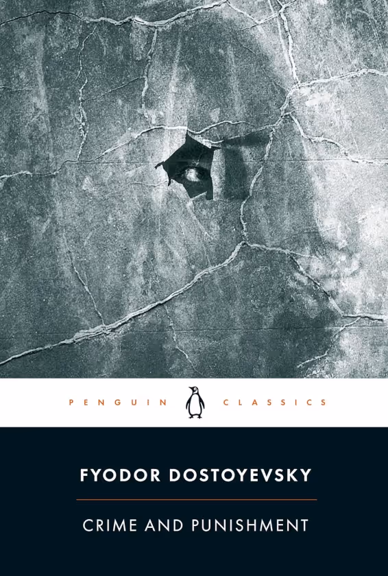 Book cover of Fyodor Dostoyevsky's Crime and Punishment featuring a cracked cement wall with a hole in the center and the Penguin Classics logo.